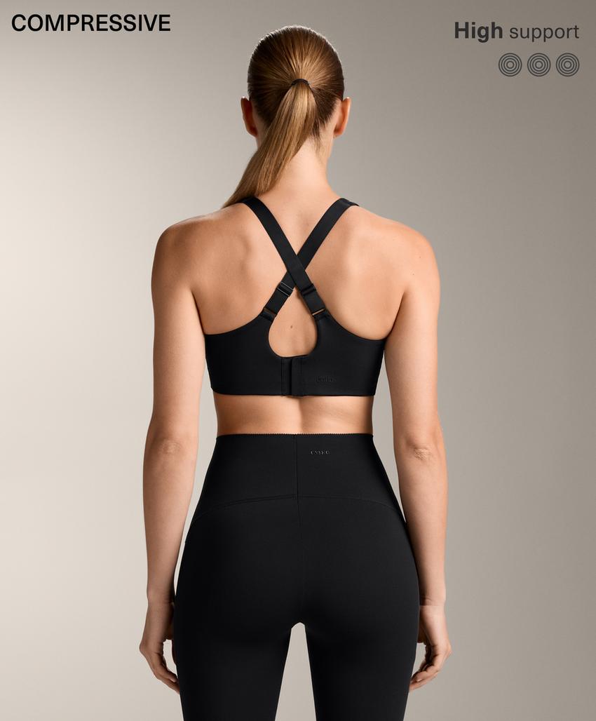 Compressive firm support cross-back sports bra