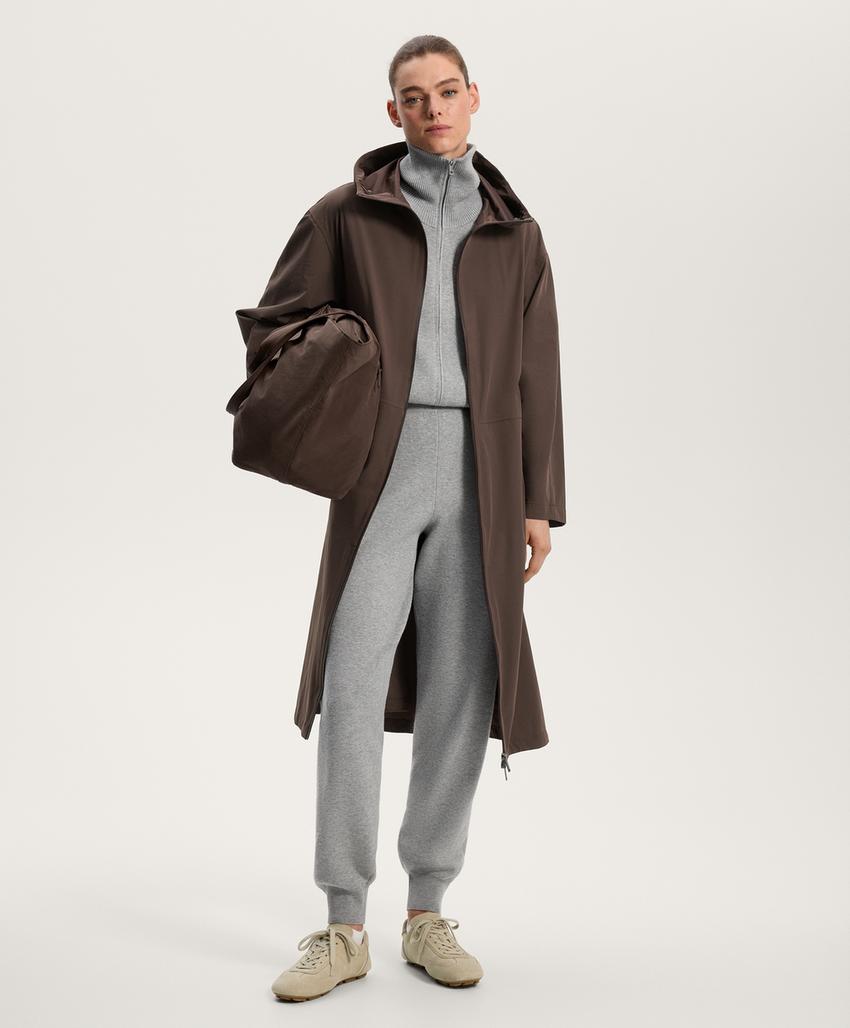 Длинный вязаный комбинезон с молнией до середины груди