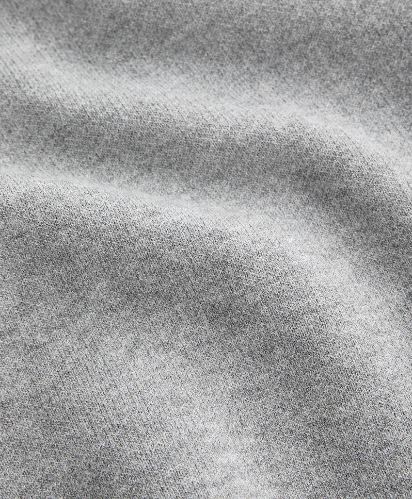 Длинный вязаный комбинезон с молнией до середины груди