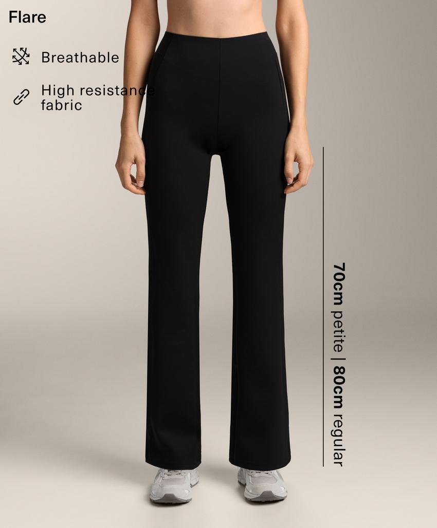 Расклешенные брюки с высокой посадкой и эффектом неопрена